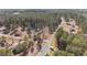 The aerial view shows several properties with ponds in a forest at 2630 Ponderosa Rd, Cameron, NC 28326