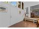 Bright foyer with brick flooring, white walls, and entry to other rooms with high ceilings and natural light at 2706 Montgomery St, Durham, NC 27705
