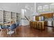 Open-concept kitchen with a dining area, counter seating, and abundant natural light, perfect for Gathering gatherings at 2706 Montgomery St, Durham, NC 27705
