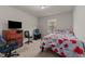Cozy bedroom with neutral tones, natural light, and comfortable layout at 274 E Boulder Road Rd, Henderson, NC 27537