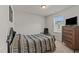 Comfortable bedroom featuring natural light, neutral walls, and plush carpet at 274 E Boulder Road Rd, Henderson, NC 27537