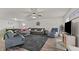 Bright open living room with ample seating on sectional and recliners at 274 E Boulder Road Rd, Henderson, NC 27537