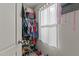 Well-organized closet featuring hanging storage and shoe rack at 274 E Boulder Road Rd, Henderson, NC 27537
