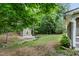 Lush backyard with garden shed and water feature at 2801 Margots, Wake Forest, NC 27587