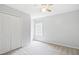 Neutral bedroom features standard closet, neutral carpet, ceiling fan, and natural light from one window at 2801 Margots, Wake Forest, NC 27587