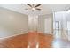 Open living space with hardwood flooring, neutral wall color, and minimalist design elements at 2801 Margots, Wake Forest, NC 27587
