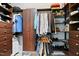 Spacious walk-in closet with custom shelving, drawers, and plenty of hanging storage space at 2801 Margots, Wake Forest, NC 27587