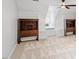 Bedroom featuring built-in window seat and matching wooden bureaus at 300 Bordeaux Ln, Cary, NC 27511