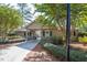 Exterior view of the community clubhouse and well-maintained landscaping at 300 Bordeaux Ln, Cary, NC 27511