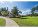 Charming outdoor event space with lush green lawns and a tented structure at 300 Bordeaux Ln, Cary, NC 27511