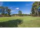 Picturesque golf course with a pond and lush greenery, creating a serene atmosphere at 300 Bordeaux Ln, Cary, NC 27511