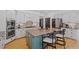 Well-equipped kitchen with custom cabinetry, granite countertops, and modern appliances at 300 Bordeaux Ln, Cary, NC 27511