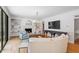 Comfortable living room with built-in bookshelves, a fireplace and lots of natural light at 300 Bordeaux Ln, Cary, NC 27511