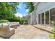 Backyard patio featuring lounge seating and access to the home's interior at 300 Bordeaux Ln, Cary, NC 27511