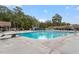 The outdoor pool has diving boards and recreational seating, providing a serene environment for residents at 300 Bordeaux Ln, Cary, NC 27511