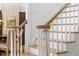 Close-up of the staircase, showcasing the wooden steps and white railing at 300 Bordeaux Ln, Cary, NC 27511