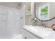 Bathroom featuring a shower-tub and granite counter at 3325 Old Buffaloe Rd, Raleigh, NC 27604