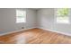 Cozy bedroom with hardwood floors and plenty of natural light at 3325 Old Buffaloe Rd, Raleigh, NC 27604