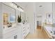 Elegant bathroom with double vanity, soaking tub, and glass-enclosed shower at 4 Pickard Pl, Durham, NC 27703