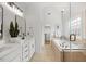 Elegant bathroom with double vanity, soaking tub, and glass-enclosed shower at 4 Pickard Pl, Durham, NC 27703