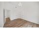 Bedroom featuring hardwood floors, natural light, large closet and neutral color scheme at 4 Pickard Pl, Durham, NC 27703