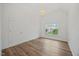 Bedroom featuring hardwood floors, natural light, and bright color scheme at 4 Pickard Pl, Durham, NC 27703