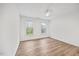 Bright, airy bedroom with luxury vinyl floors, ceiling fan and a window providing natural light at 4 Pickard Pl, Durham, NC 27703