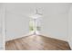 Bright, airy bedroom with luxury vinyl floors, ceiling fan and a window providing natural light at 4 Pickard Pl, Durham, NC 27703