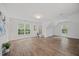 Bright bonus room featuring hardwood floors, natural light, and neutral color scheme at 4 Pickard Pl, Durham, NC 27703