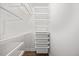 Walk-in closet featuring white shelving and ample storage space at 4 Pickard Pl, Durham, NC 27703