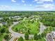 Aerial view of circular community park with walking paths, trees, and landscaped features at 4 Pickard Pl, Durham, NC 27703