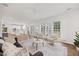 Open-concept living area showcasing hardwood floors, a fireplace, and seamless flow to the kitchen at 4 Pickard Pl, Durham, NC 27703