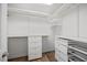 Well-organized walk-in closet with custom shelving and storage drawers at 4 Pickard Pl, Durham, NC 27703