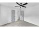 The bedroom is freshly painted and has a ceiling fan, soft carpet, and neutral décor at 460 Bunn Elementary School Rd, Bunn, NC 27508