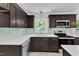 Kitchen with stainless appliances, sleek backsplash, and ample counterspace at 460 Bunn Elementary School Rd, Bunn, NC 27508