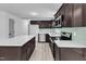 Modern kitchen features stainless appliances, an island, and ample counterspace at 460 Bunn Elementary School Rd, Bunn, NC 27508