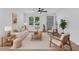 Bright living room with modern furnishings, neutral tones, and ample natural light at 460 Bunn Elementary School Rd, Bunn, NC 27508