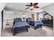 Upstairs bedroom featuring two beds, a ceiling fan, and neutral carpet at 479 Manchester Trail, Clayton, NC 27527