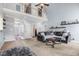 Open-concept living room with high ceilings and a view of the entryway at 479 Manchester Trail, Clayton, NC 27527