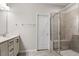 Bathroom features a shower with glass enclosure and a single sink vanity at 520 Kenton Mill Ct, Rolesville, NC 27571