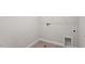 Unfinished laundry room with tile floor, utility connections, and neutral walls at 520 Kenton Mill Ct, Rolesville, NC 27571