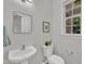 Well-lit half bathroom features modern fixtures and a clean, minimalist design with neutral wall color at 522 N Scotswood Blvd, Hillsborough, NC 27278