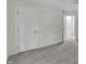 Bedroom with new carpet, fresh paint, and an entry to the hallway at 522 N Scotswood Blvd, Hillsborough, NC 27278