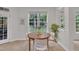 This breakfast nook has many windows providing natural light and great views of the yard at 522 N Scotswood Blvd, Hillsborough, NC 27278
