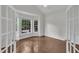 This office features French doors, hardwood floors, and a bay window at 522 N Scotswood Blvd, Hillsborough, NC 27278