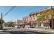 A commercial district shows a row of brick buildings with shops and restaurants on a sunny day at 522 N Scotswood Blvd, Hillsborough, NC 27278