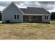 Beautiful single-story home with a covered porch and a spacious yard, ideal for outdoor living at 55 Leah Ln, Louisburg, NC 27549