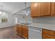 Functional kitchen design offers ample counter space and a stainless steel dual sink at 5506 Cottonrose Ln, Raleigh, NC 27606