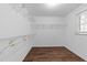 Large walk-in closet with ample shelving for storage solutions at 5506 Cottonrose Ln, Raleigh, NC 27606