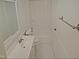 A traditional bathroom featuring a tub, toilet, vanity, and tile floor at 5614 Skyline Dr, Durham, NC 27712